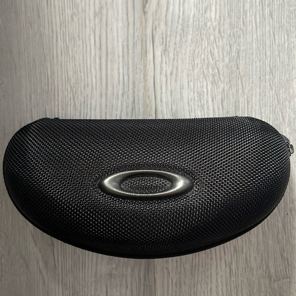 Oakley glasses case zip around.